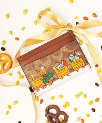 ＜COACH＞ホリデー　エッセンシャル　カード　ケース・シグネチャー　キャンバス・トレイン